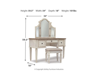 Realyn Queen Upholstery Panel Bed, Dresser, Chest, Nightstand, and Vanity Set