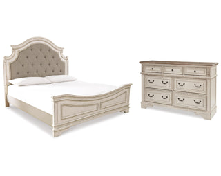 Realyn King Upholstered Panel Bed and Dresser