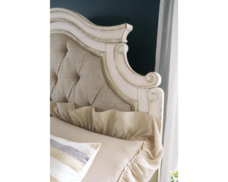 Realyn Queen Upholstery Panel Bed, Dresser, Chest, Nightstand, and Vanity Set