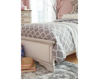 Realyn King Upholstered Panel Bed