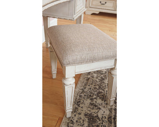 Realyn Queen Upholstery Panel Bed, Dresser, Chest, Nightstand, and Vanity Set