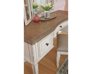 Realyn Queen Upholstery Panel Bed, Dresser, Chest, Nightstand, and Vanity Set